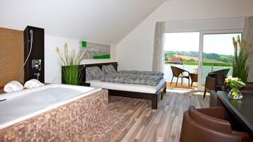 Suite Superior Junior avec baignoire balnéo | Ropa de cama de alta calidad, minibar, caja fuerte y escritorio