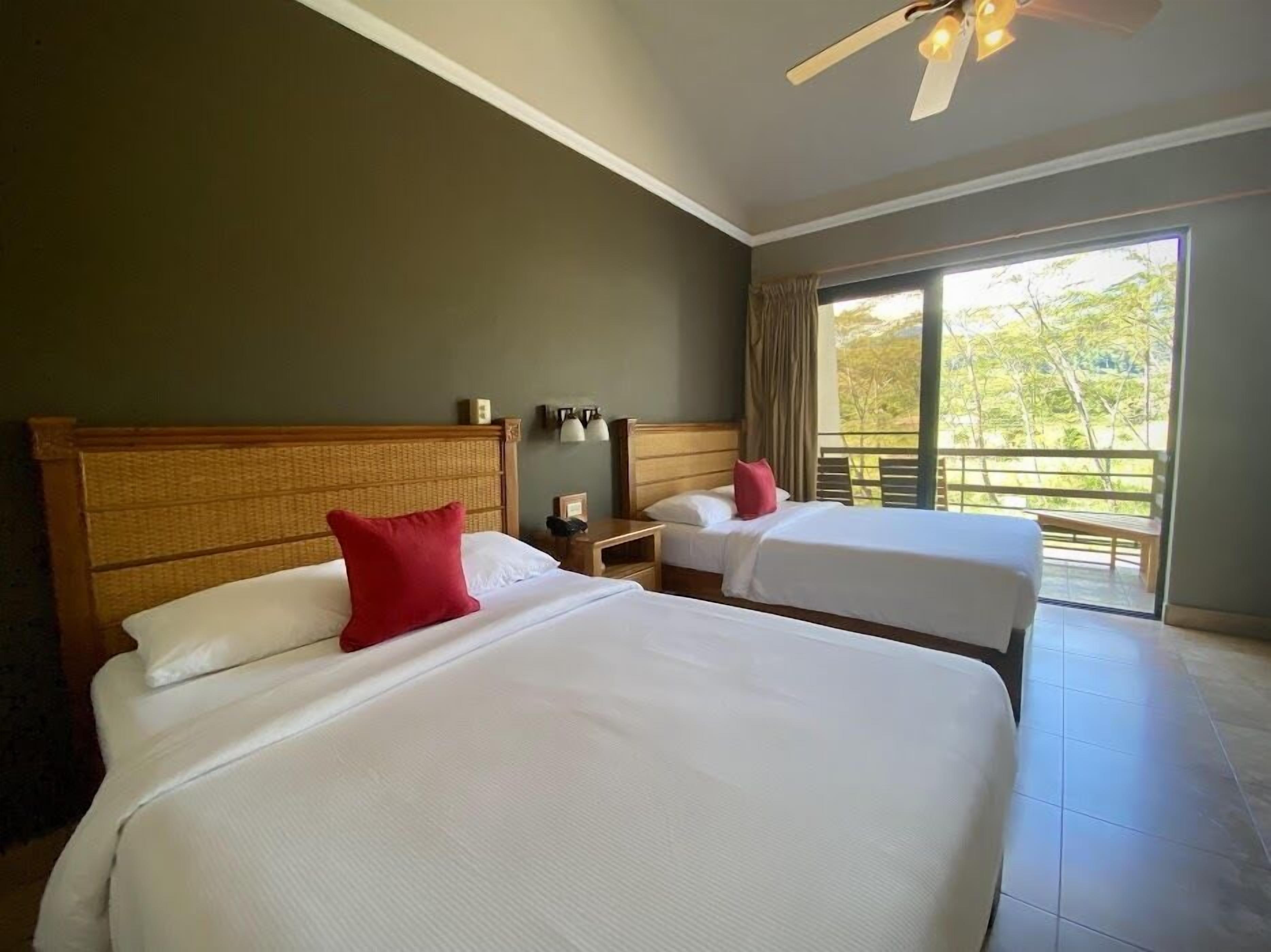 standard double room, 2 queen beds | in-room safe, desk, free wifi, bed sheets