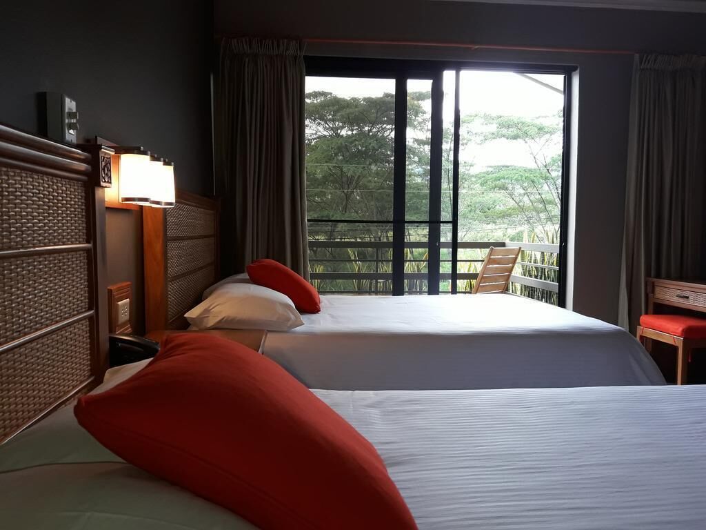 standard double room, 2 queen beds | in-room safe, desk, free wifi, bed sheets