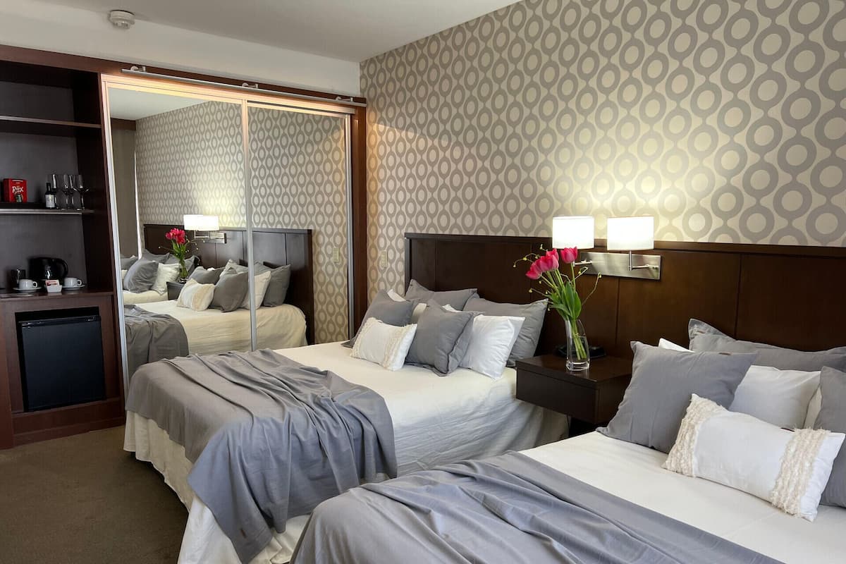 Hypo-allergenic bedding, down duvets, minibar, in-room safe