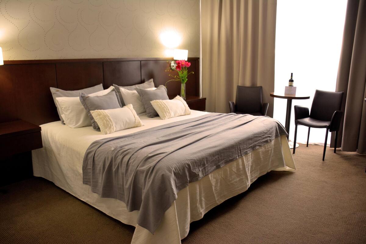 Hypo-allergenic bedding available, down comforters, minibar