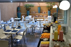 Daily buffet breakfast (USD 18 per person)