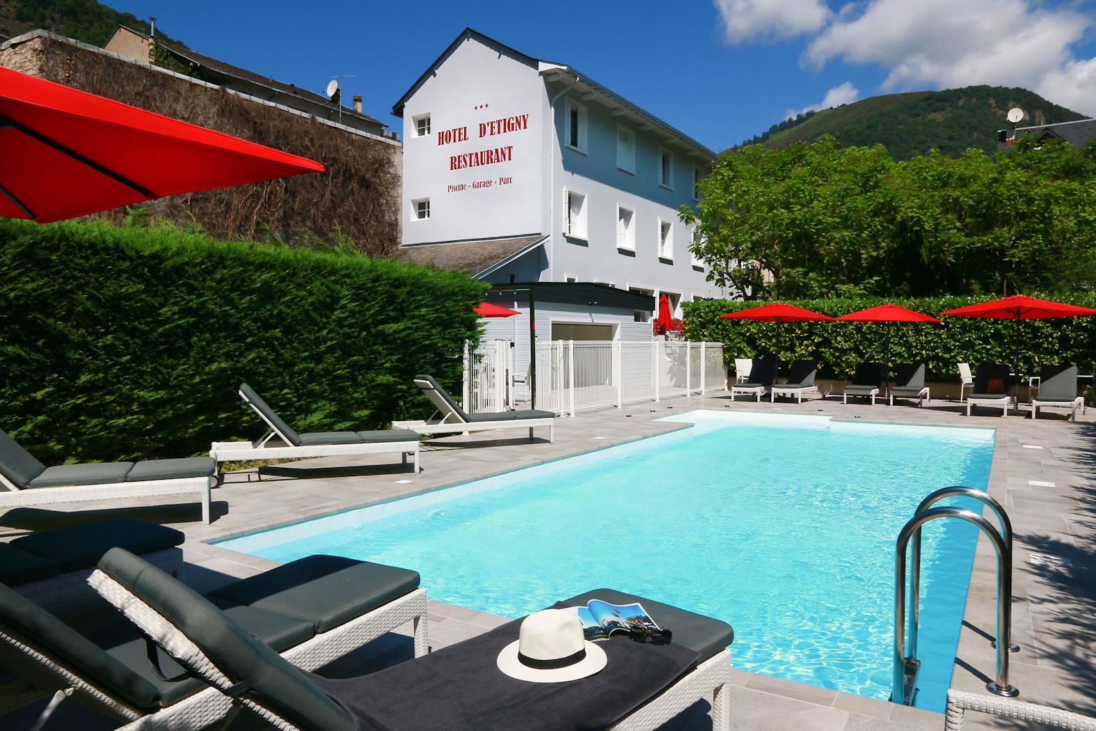 outdoor pool, open 10 am to 9:00 pm, pool loungers