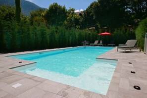 Outdoor pool, open 10 AM to 9:00 PM, sun loungers