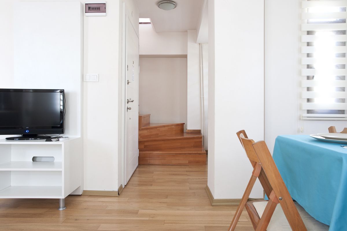 Duplex família, 1 cama Queen e sofá-cama, terraço, vista para a cidade | Área de estar | TV LCD 32 polegadas com canais via satélite, TV