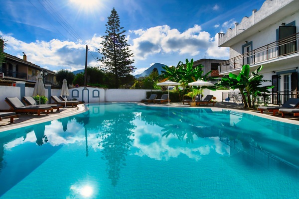 Seasonal outdoor pool, open 9 AM to 7 PM, pool umbrellas, sun loungers