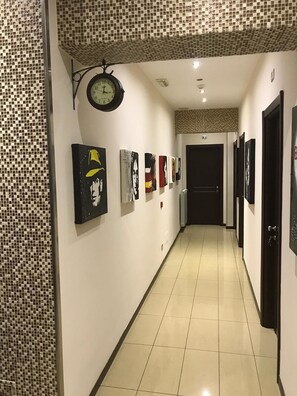 Habitación Deluxe, baño privado | Entrada al alojamiento