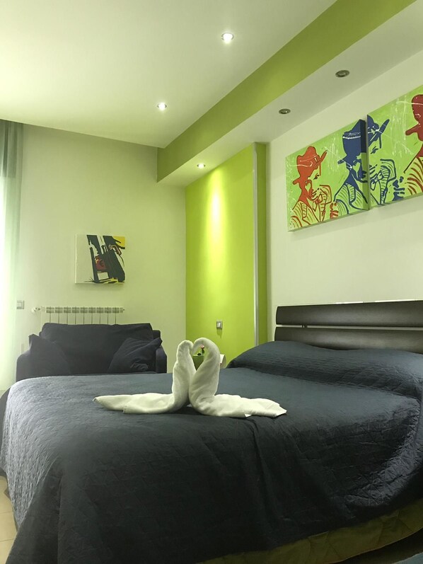 Premium bedding, memory-foam beds, in-room safe, individually decorated