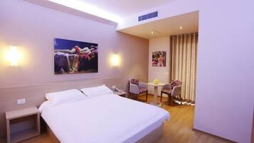 Premium bedding, down duvets, minibar, desk