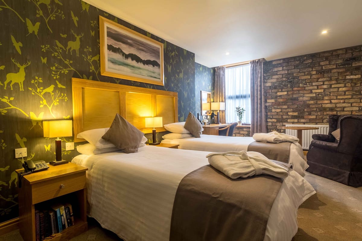 deluxe double / twin room (washington central hotel) | 1 bedroom, premium bedding, in-room safe, individually decorated