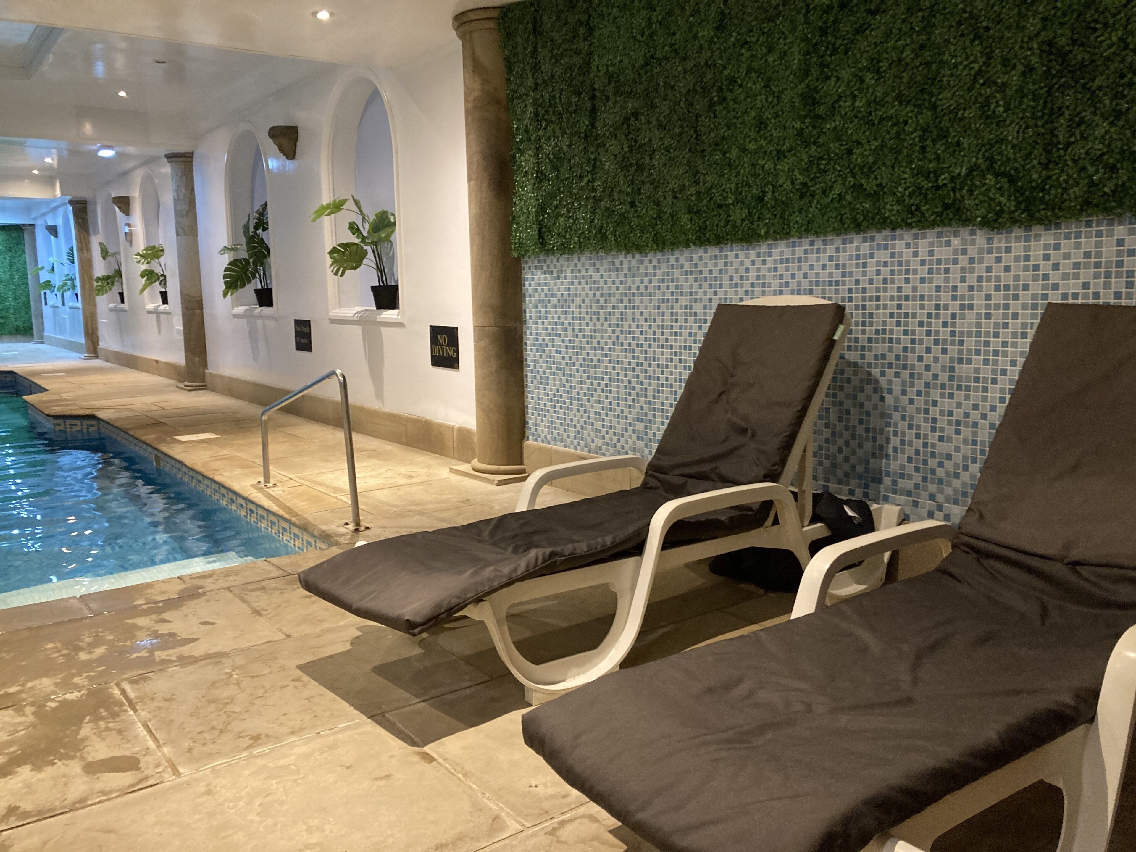 indoor pool, pool loungers