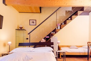 Premium bedding, down comforters, pillowtop beds, minibar