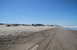 Plage, parasols, serviettes de plage
