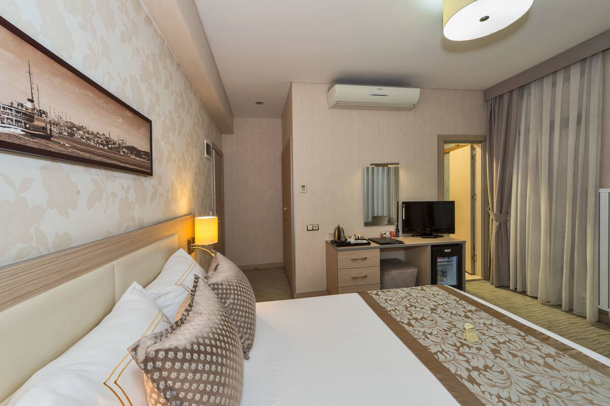 Hypo-allergenic bedding available, memory foam beds, minibar