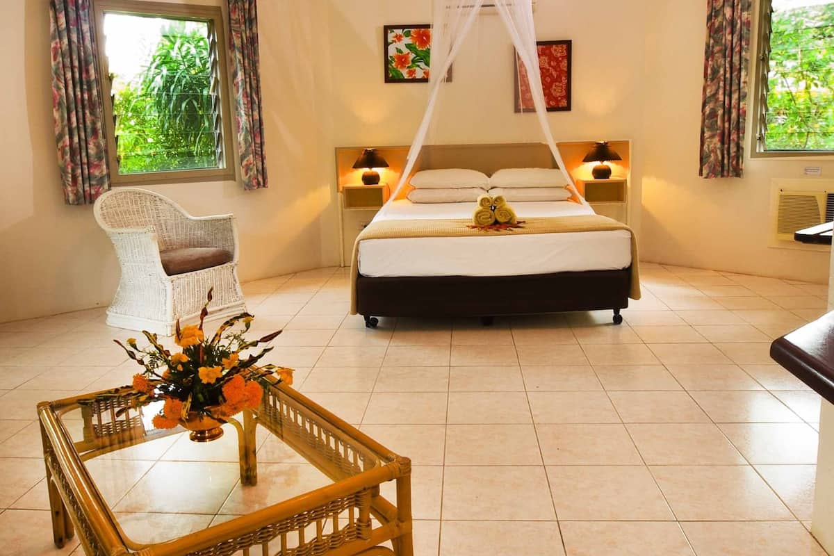 basic bungalow, 1 queen bed with sofa bed, garden view | premium bedding, in-room safe, iron/ironing board, bed sheets