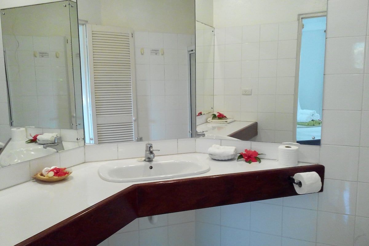 basic bungalow, 1 queen bed with sofa bed, garden view | bathroom | shower, free toiletries, hair dryer, towels