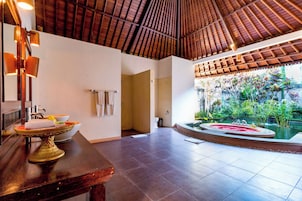 Deluxe Villa, 1 Bedroom | Bathroom | Separate tub and shower, deep soaking tub, rainfall showerhead