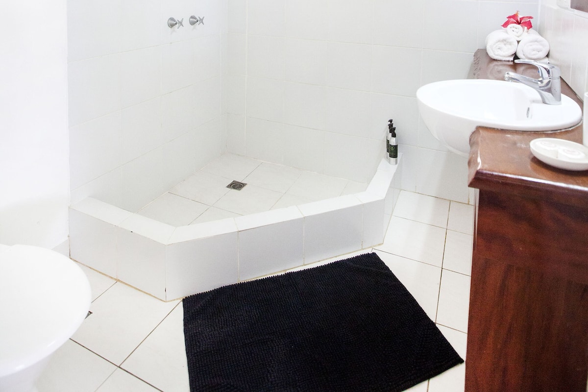 shower, eco-friendly toiletries, towels