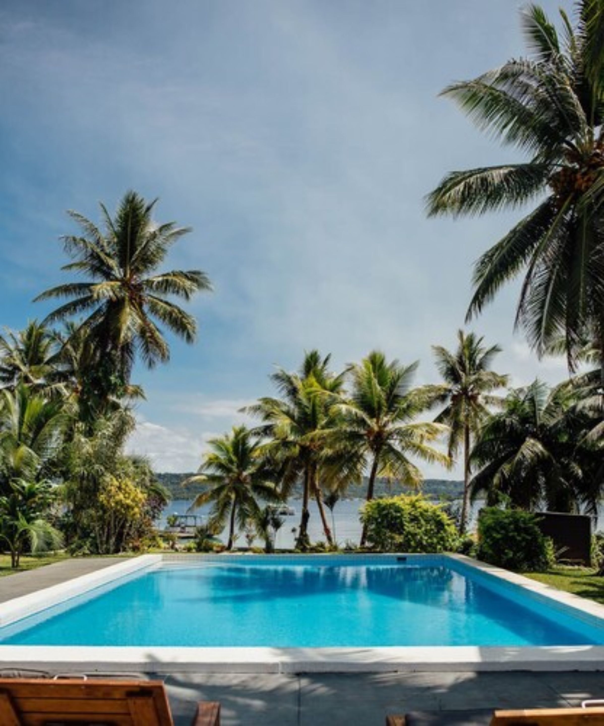 outdoor pool, pool umbrellas, pool loungers