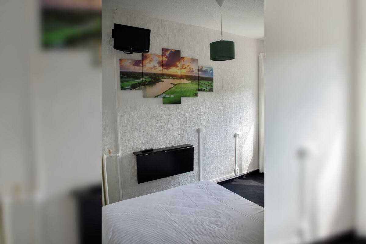 Standard Room | In-room safe, individually decorated, desk, blackout curtains