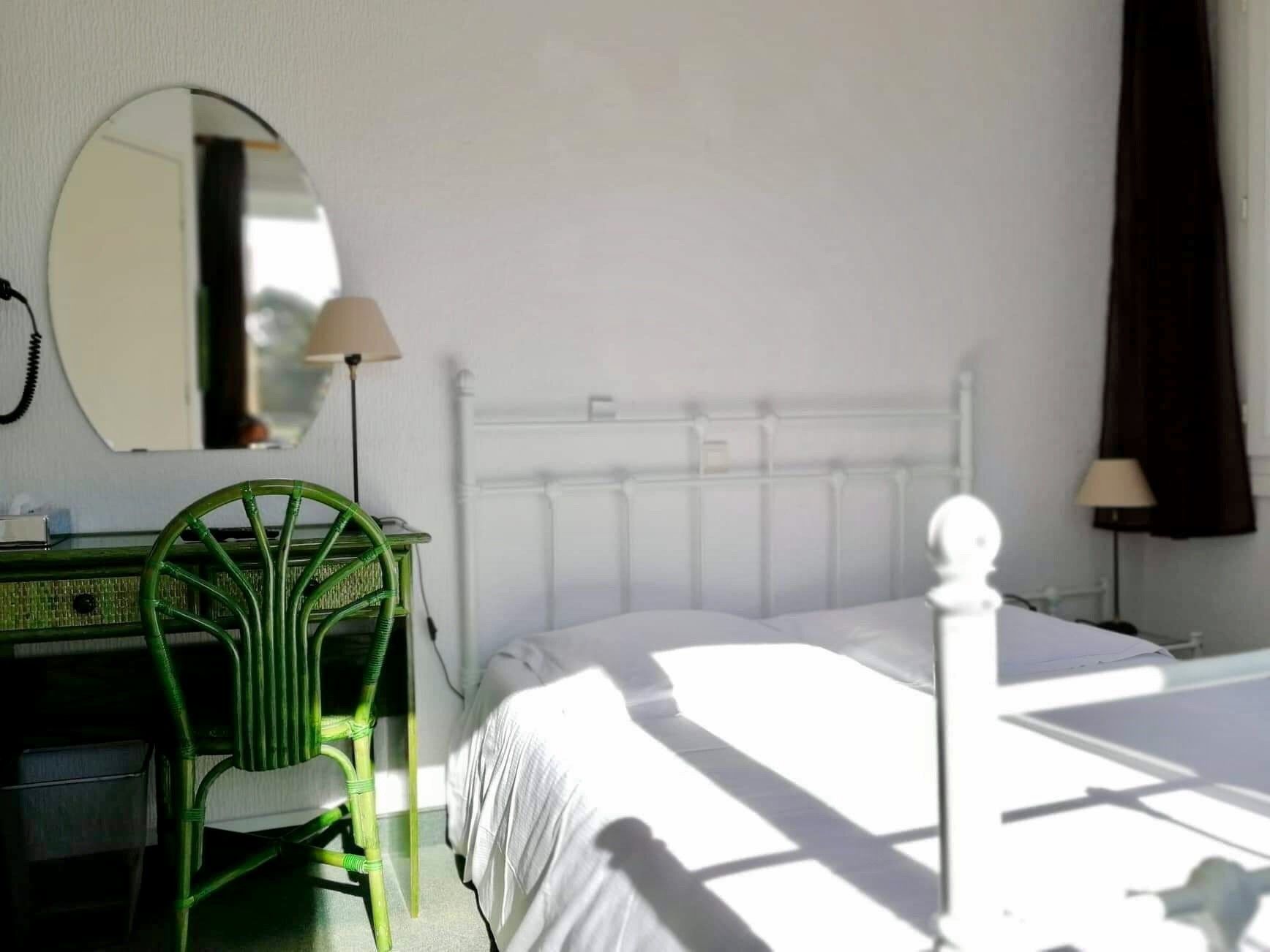 twin room | in-room safe, individually decorated, desk, blackout curtains