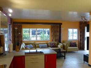 Comfort Apartment, 3 Bedrooms | Living room | LCD TV, DVD player - Kekemba Apartments Paramaribo (Paramaribo)