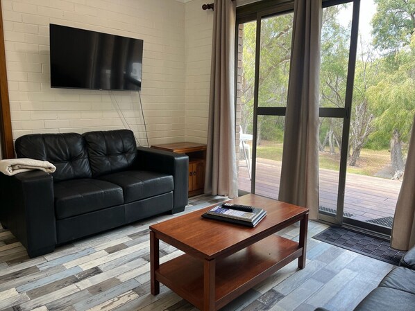 32-inch flat-screen TV with digital channels, TV, DVD player