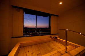 Premium Room (with Tatami Area - Room 801) | Bathroom | Combined shower/tub, deep soaking tub, free toiletries, hair dryer - Kikunan Onsen UBL Hotel (Kumamoto)