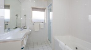 Designer toiletries, hair dryer, towels, soap