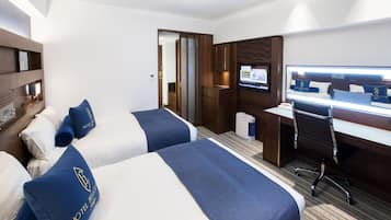 Premium bedding, down comforters, in-room safe, desk