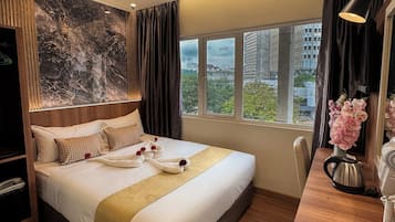 Premium bedding, Select Comfort beds, desk, blackout curtains