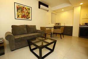 Kamer, 1 slaapkamer | Zitruimte lobby