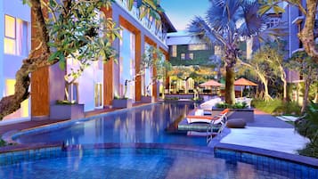Outdoor pool, open 7:00 AM to 7:00 PM, pool umbrellas, pool loungers