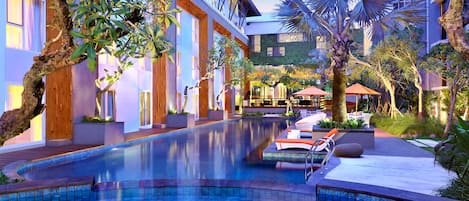 Outdoor pool, open 6:00 AM to 6:00 PM, pool umbrellas, pool loungers