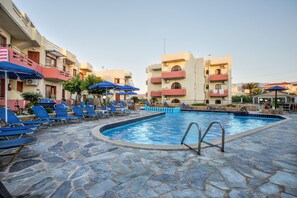 Outdoor pool, pool umbrellas, pool loungers