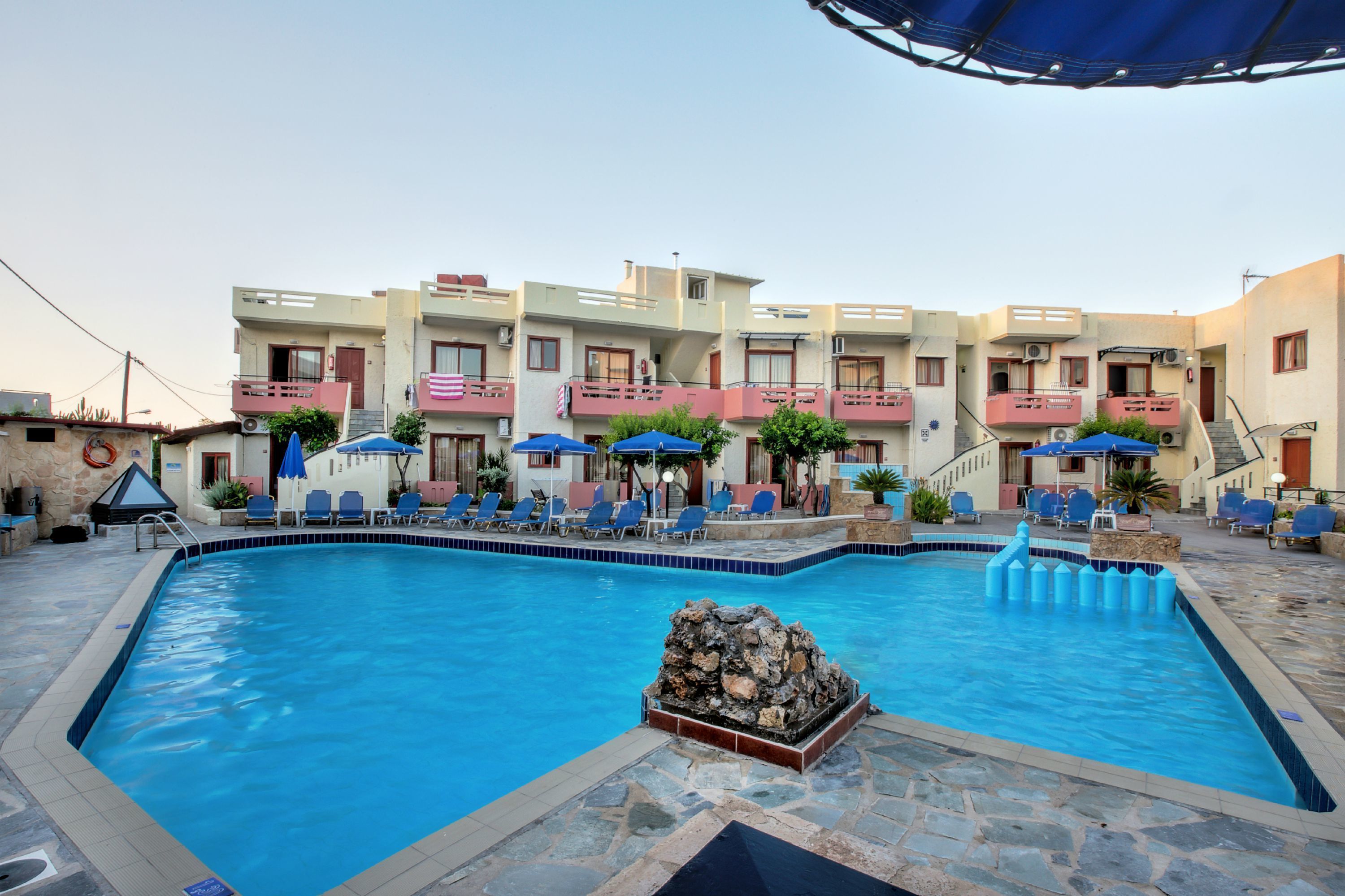 Outdoor pool, pool umbrellas, pool loungers