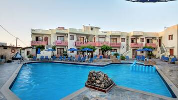 Outdoor pool, pool umbrellas, pool loungers