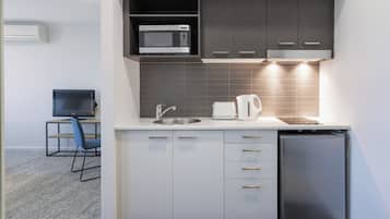 Microwave, stovetop, coffee/tea maker, electric kettle