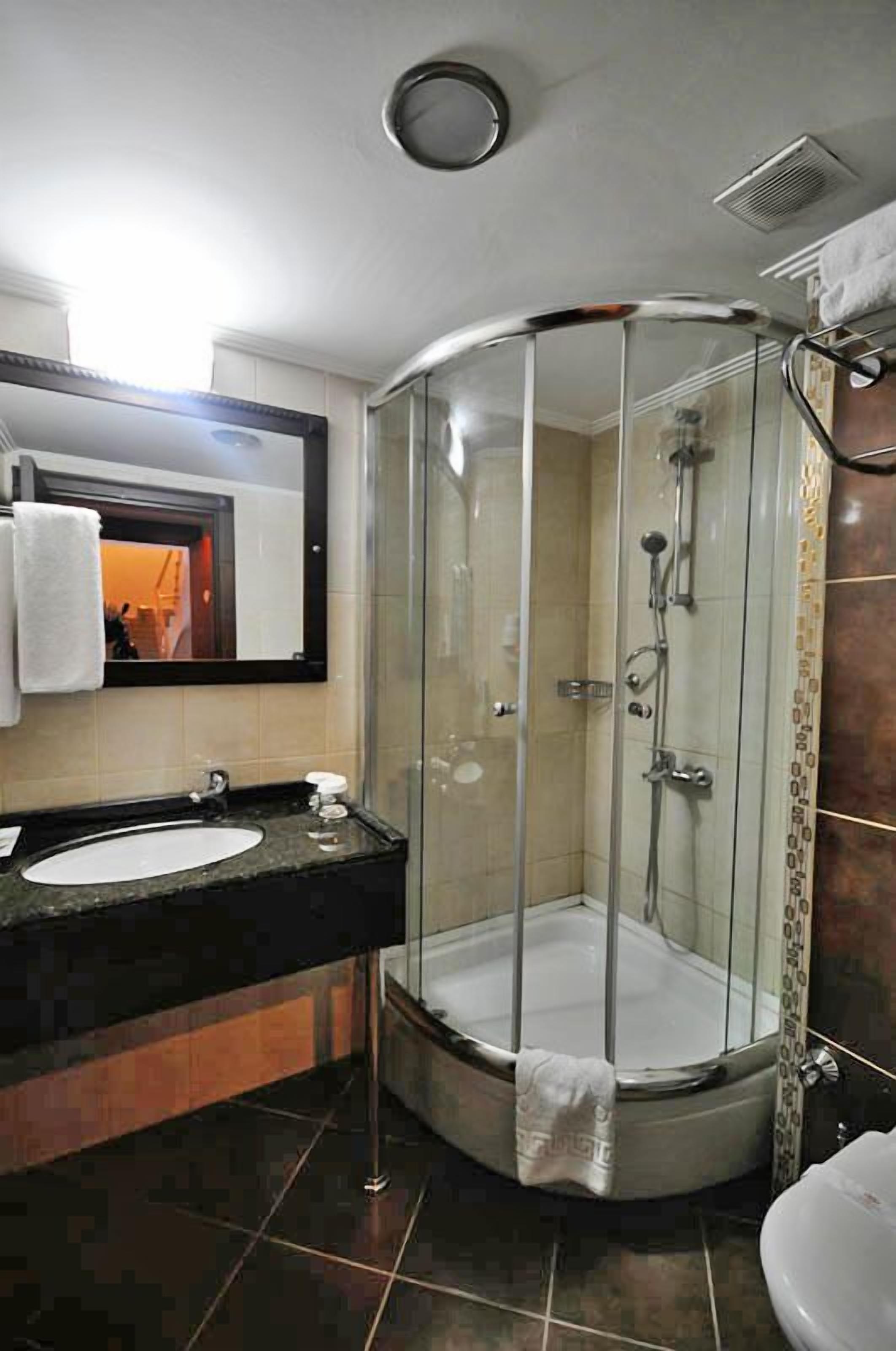 shower, free toiletries, hair dryer, slippers