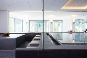 2 indoor pools, outdoor pool, open 6 AM to 8 PM, pool umbrellas