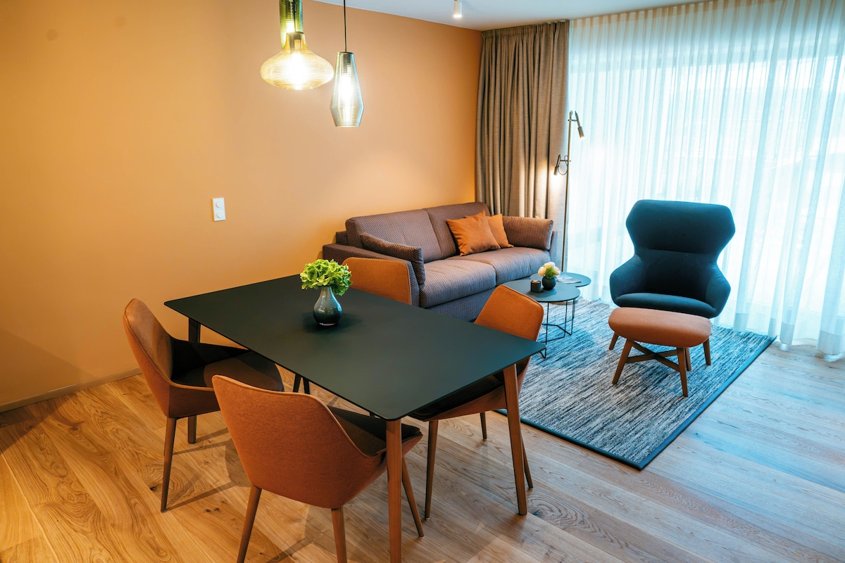 Maisonette-Suite | Living area | Flat-screen TV