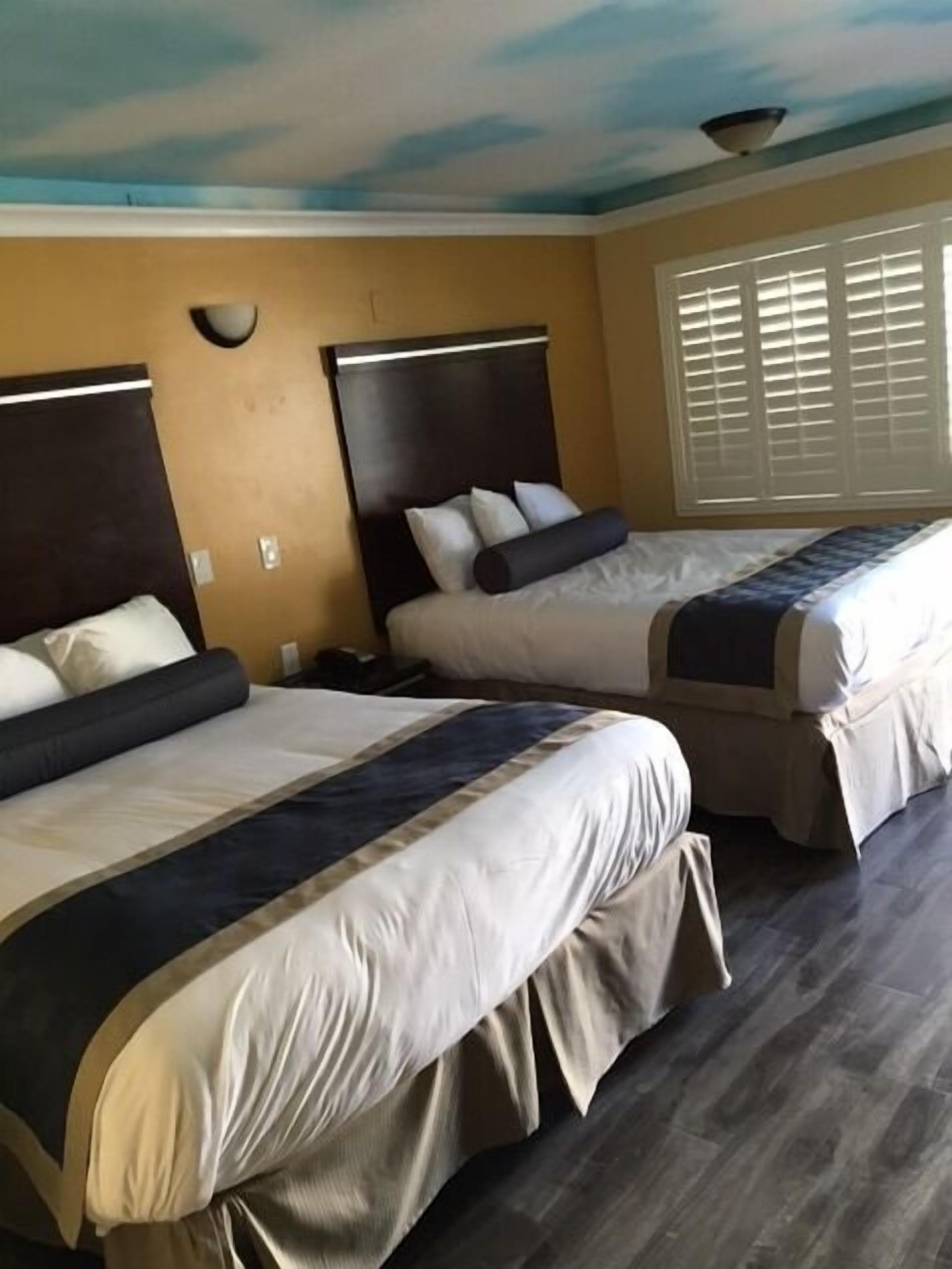 Standard Room, 2 Queen Beds, Non Smoking | Iron/ironing board, free WiFi, bed sheets, alarm clocks