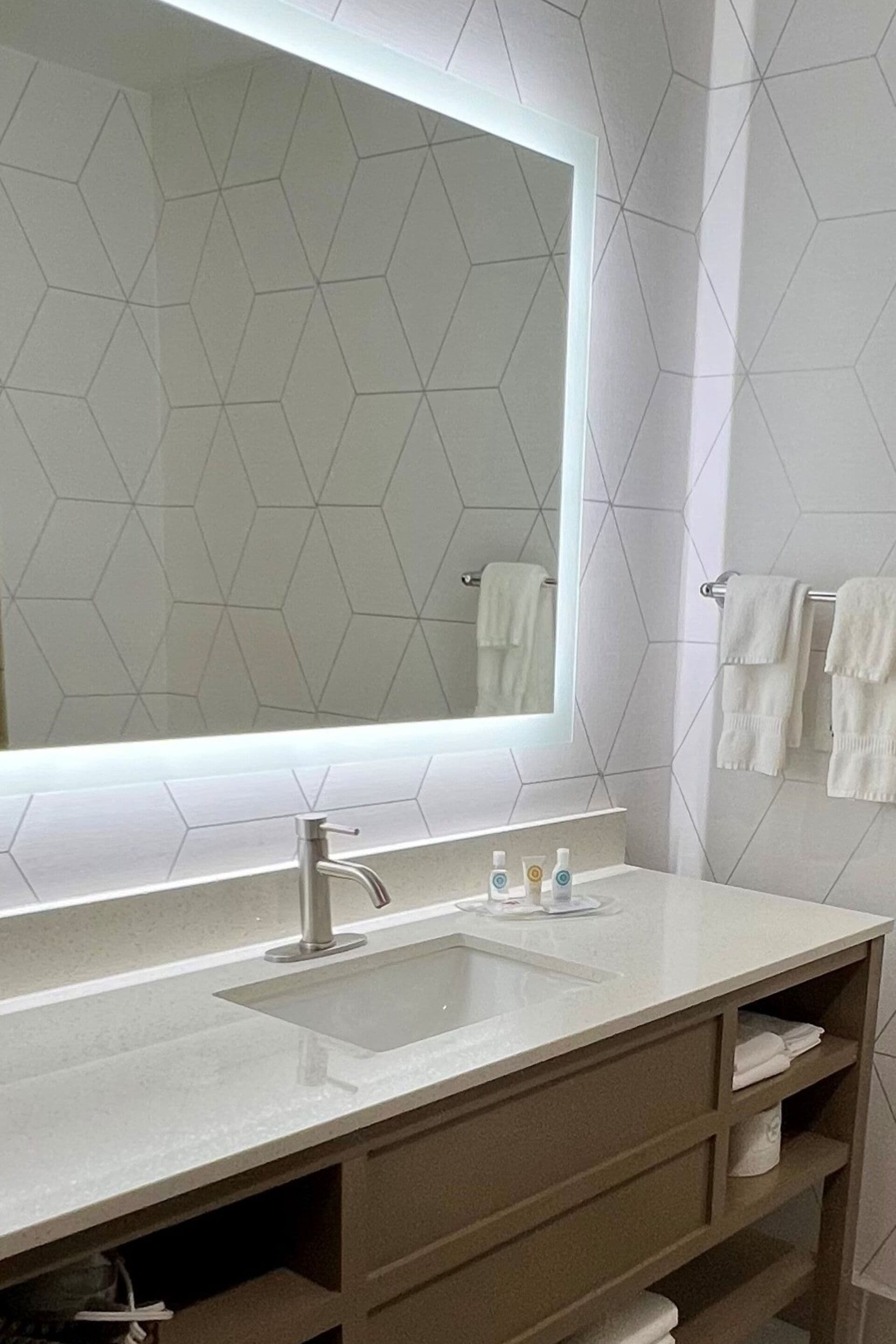 combined shower/bathtub, deep-soaking bathtub, hair dryer, towels