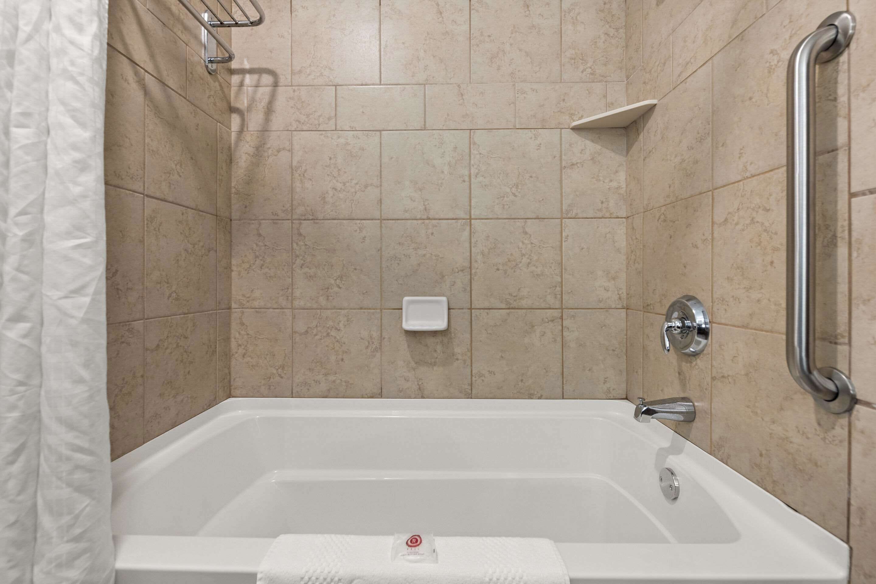 premium bedding, pillow-top beds, desk, laptop workspace