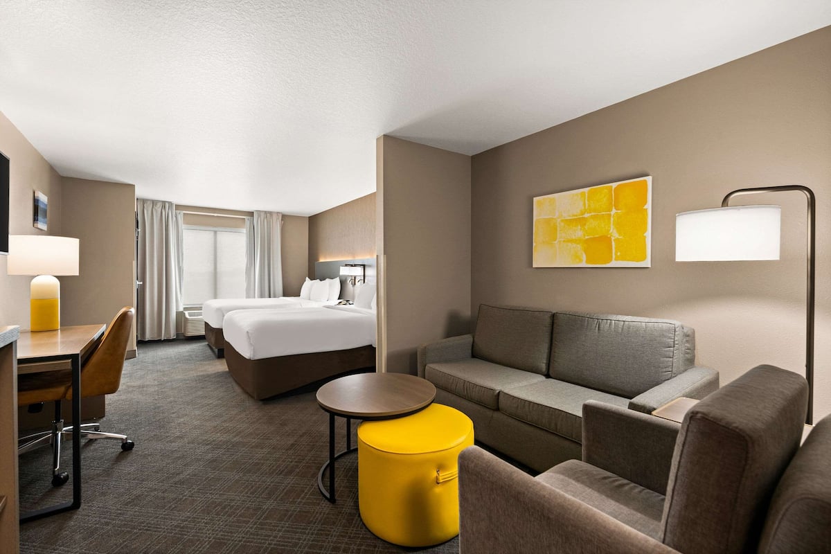 Premium bedding, pillow-top beds, desk, laptop workspace