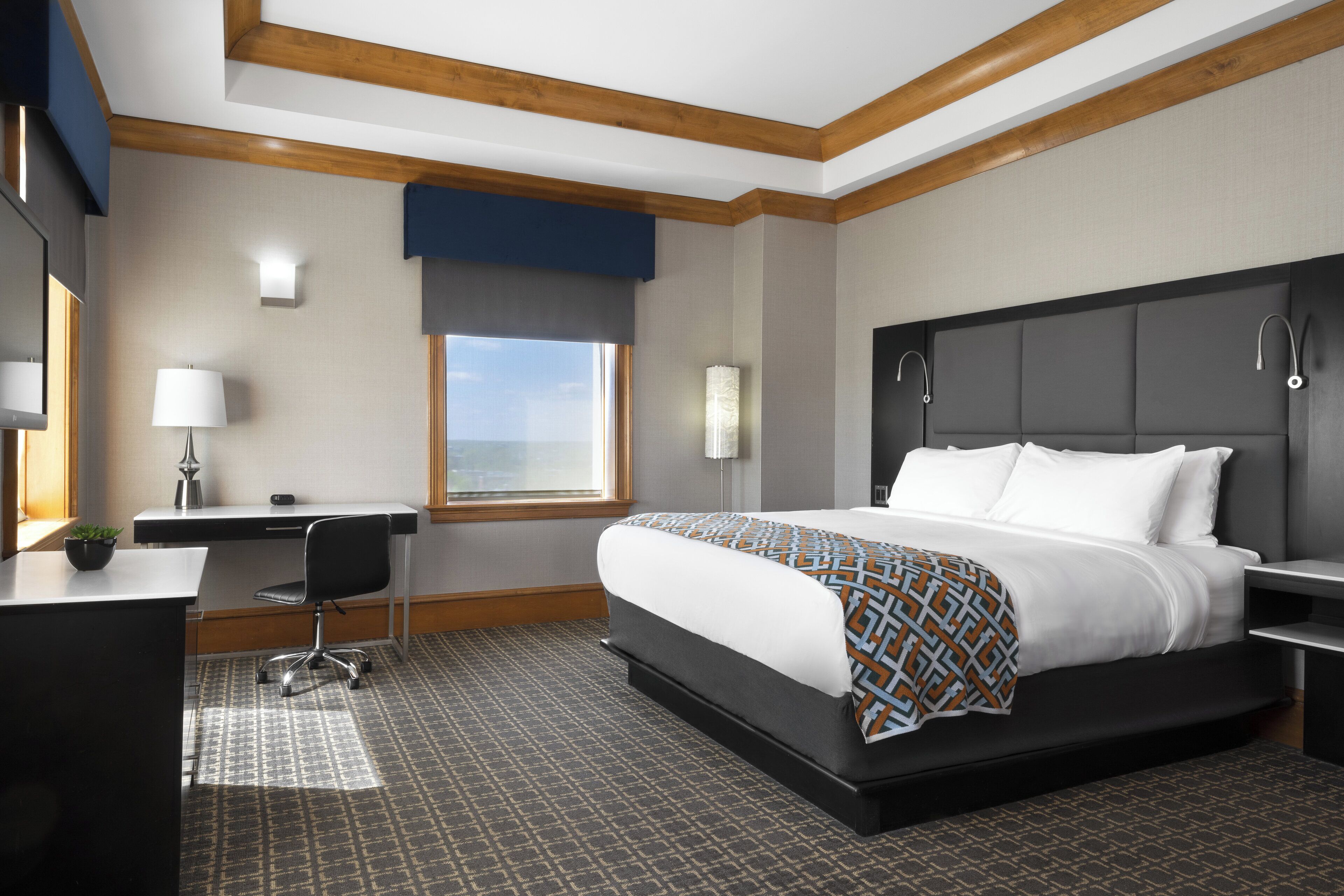 Premium bedding, down comforters, pillowtop beds, minibar