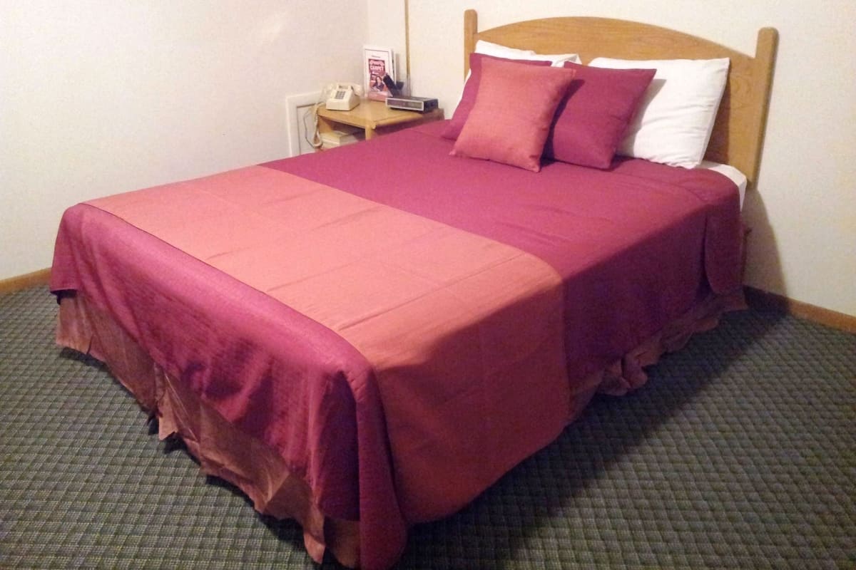 Individually furnished, desk, blackout drapes, iron/ironing board