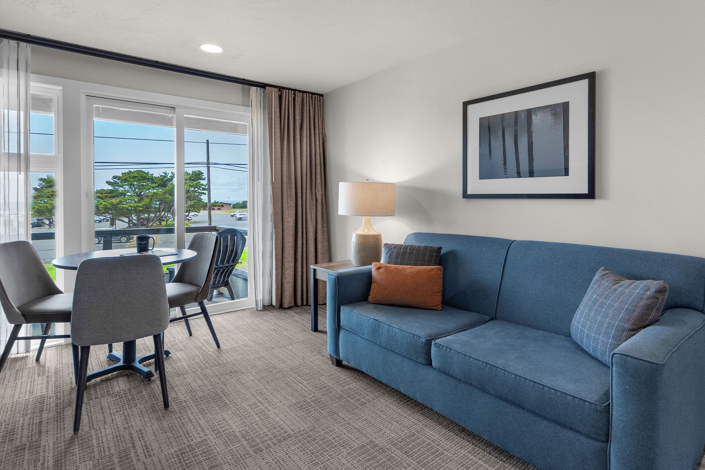 suite, 1 queen bed with sofa bed, kitchen, partial ocean view | view from room