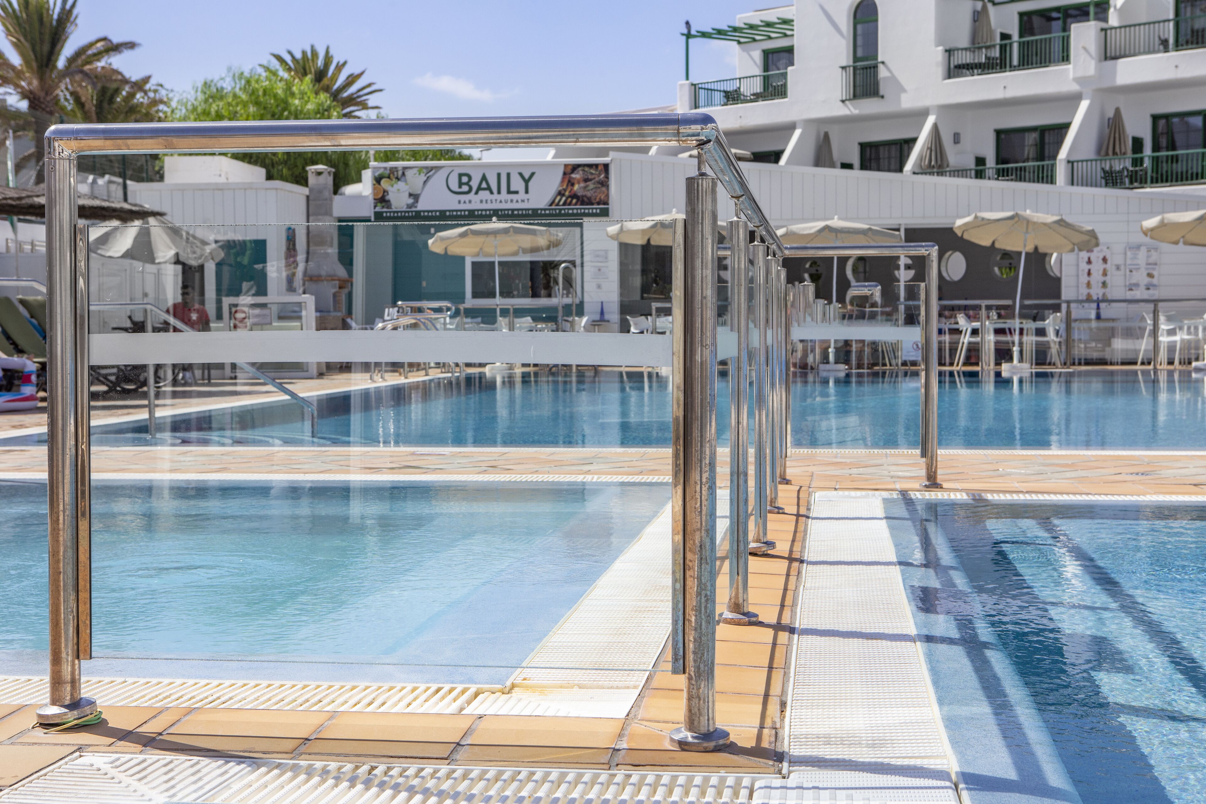 outdoor pool, pool loungers