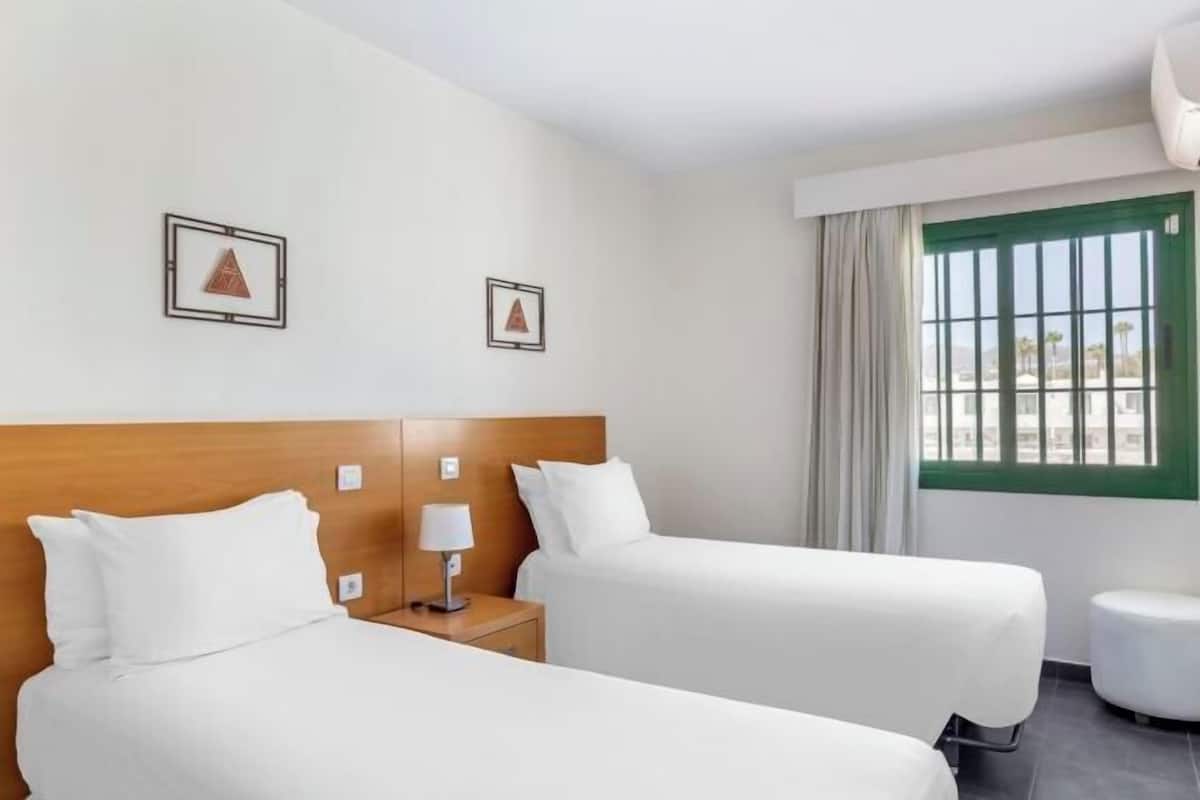 In-room safe, iron/ironing board, cribs (free), WiFi (free)